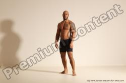 Underwear Gymnastic poses Man Black Muscular Bald Dancing Dynamic poses Academic